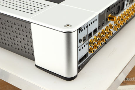 Rear right corner of a used Meridian G61R Controller in a silver finish