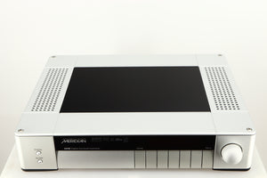 Top of a used Meridian G61R Controller in a silver finish