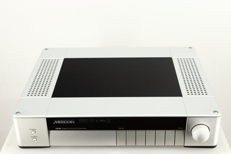 Top of a used Meridian G61R Controller in a silver finish
