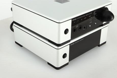 Front left view of a used Meridian Prime Headphone Amplifier and Power Supply in silver finish