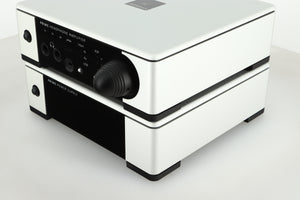 Front right view of a used Meridian Prime Headphone Amplifier and Power Supply in silver finish