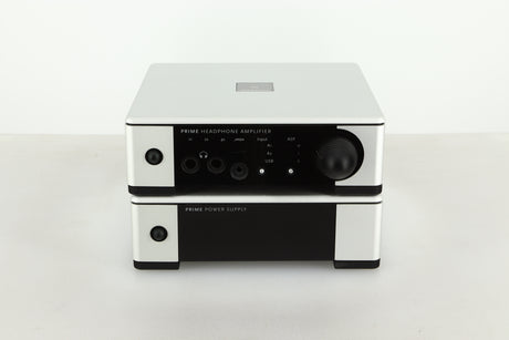 Front view of a used Meridian Prime Headphone Amplifier and Power Supply in silver finish