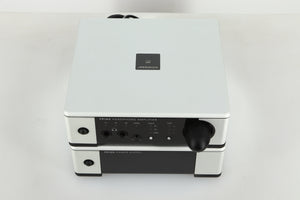 Top view of a used Meridian Prime Headphone Amplifier and Power Supply in silver finish