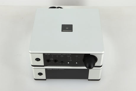 Top view of a used Meridian Prime Headphone Amplifier and Power Supply in silver finish