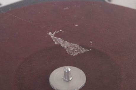 Close up of a used Michell Focus One Turntable (No Arm) (Spares / Repair) showing marks and scratching on lid