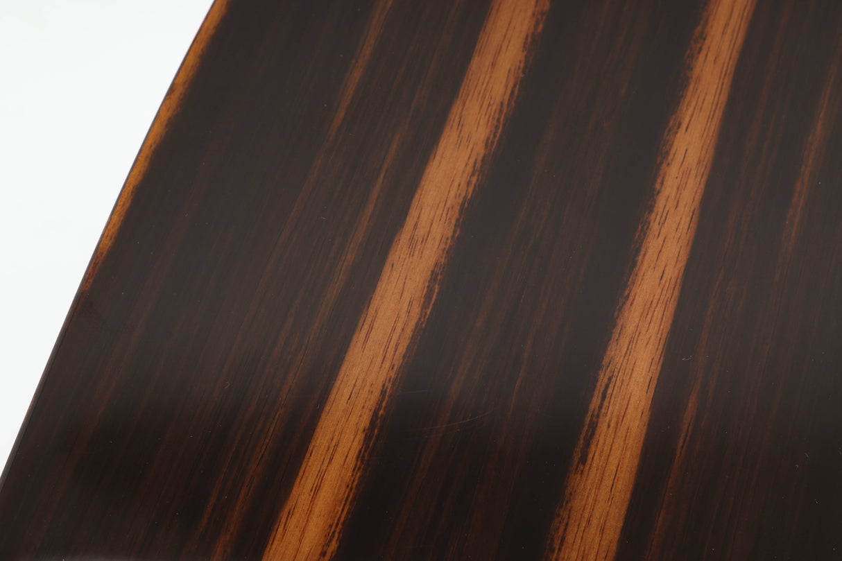 Close up of a used Monitor Audio Gold 50 Standmount Speakers in a piano ebony finish showing some scratches on top