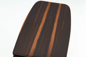Close up of a used Monitor Audio Gold 50 Standmount Speakers in a piano ebony finish showing some scratches on top