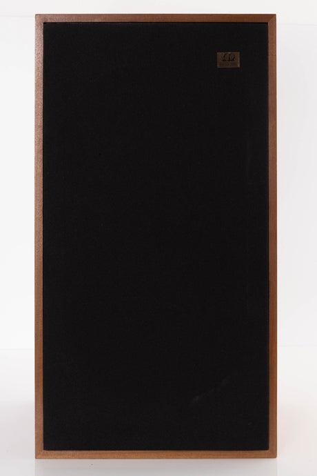 Front view of a used Monitor Audio MA5 Series II Standmount Speakers in a Teak finish showing Grille
