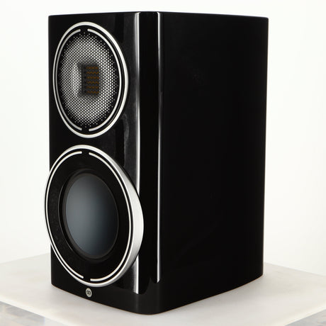 Front right corner of a used Monitor Audio Platinum PL100 III Standmount Speaker in a piano black finish