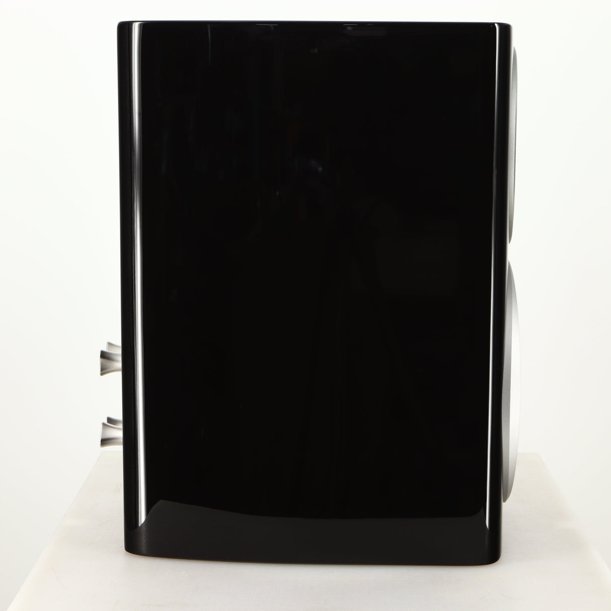 Left side view of a used Monitor Audio Platinum PL100 III Standmount Speaker in a piano black finish