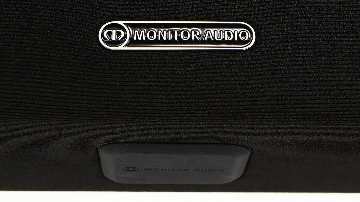 Close up of a used Monitor Audio SB-4 Soundbar in a black finish showing logo