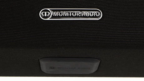 Close up of a used Monitor Audio SB-4 Soundbar in a black finish showing logo