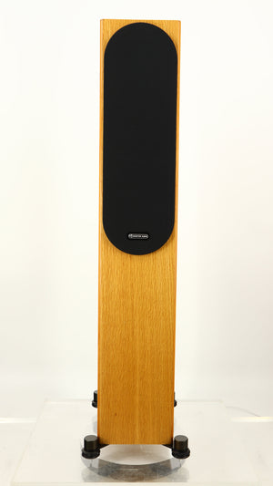Front view of a used Monitor Audio Silver 200 6G Floorstanding Speakers in an oak finish showing Grille