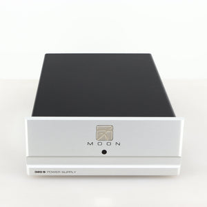 Front view of a used Moon 320S Power Supply in a silver finish