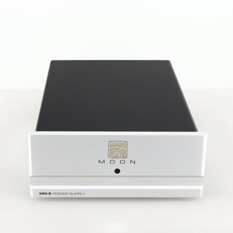 Front view of a used Moon 320S Power Supply in a silver finish