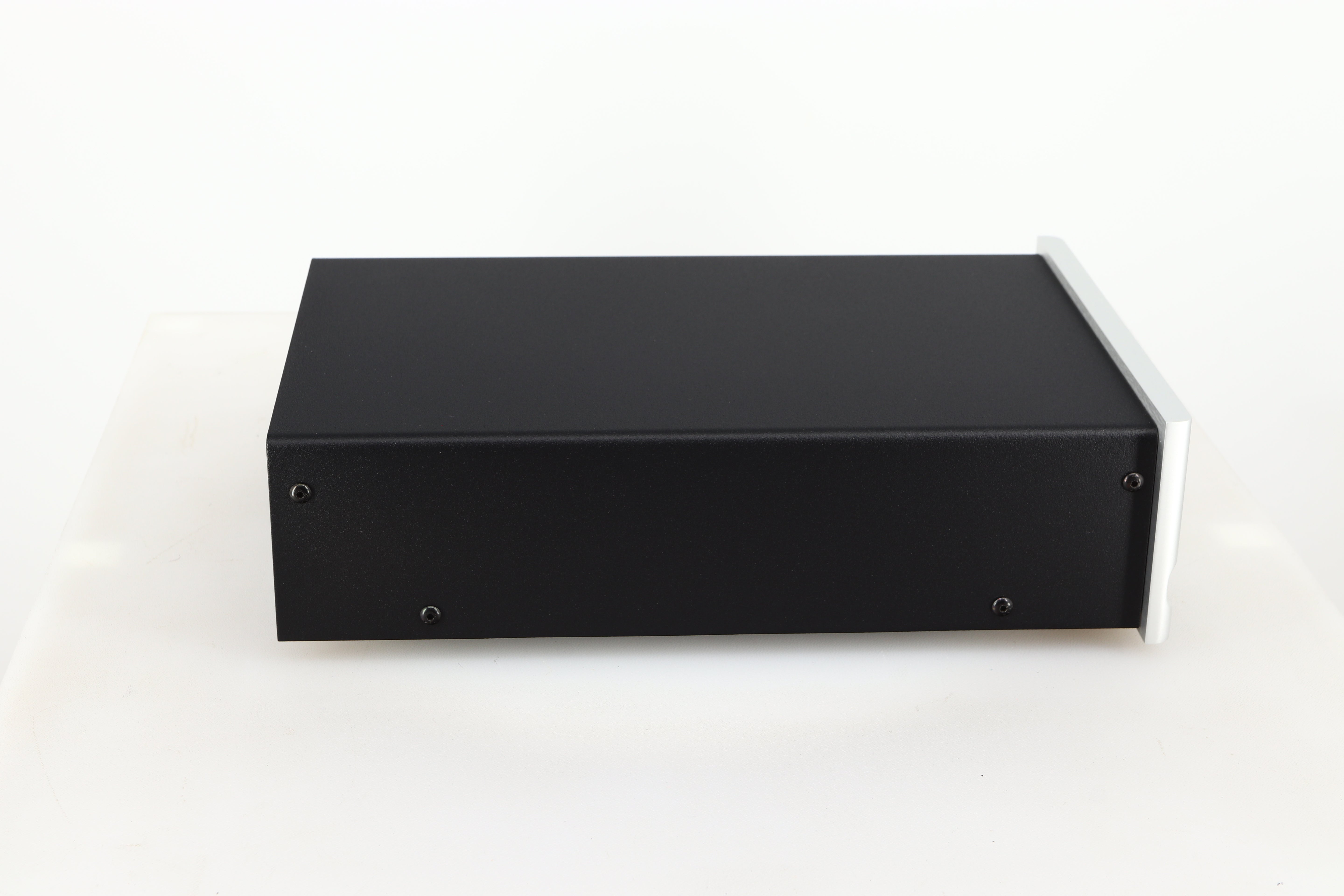 Left side view of a used Moon 320S Power Supply in a silver finish