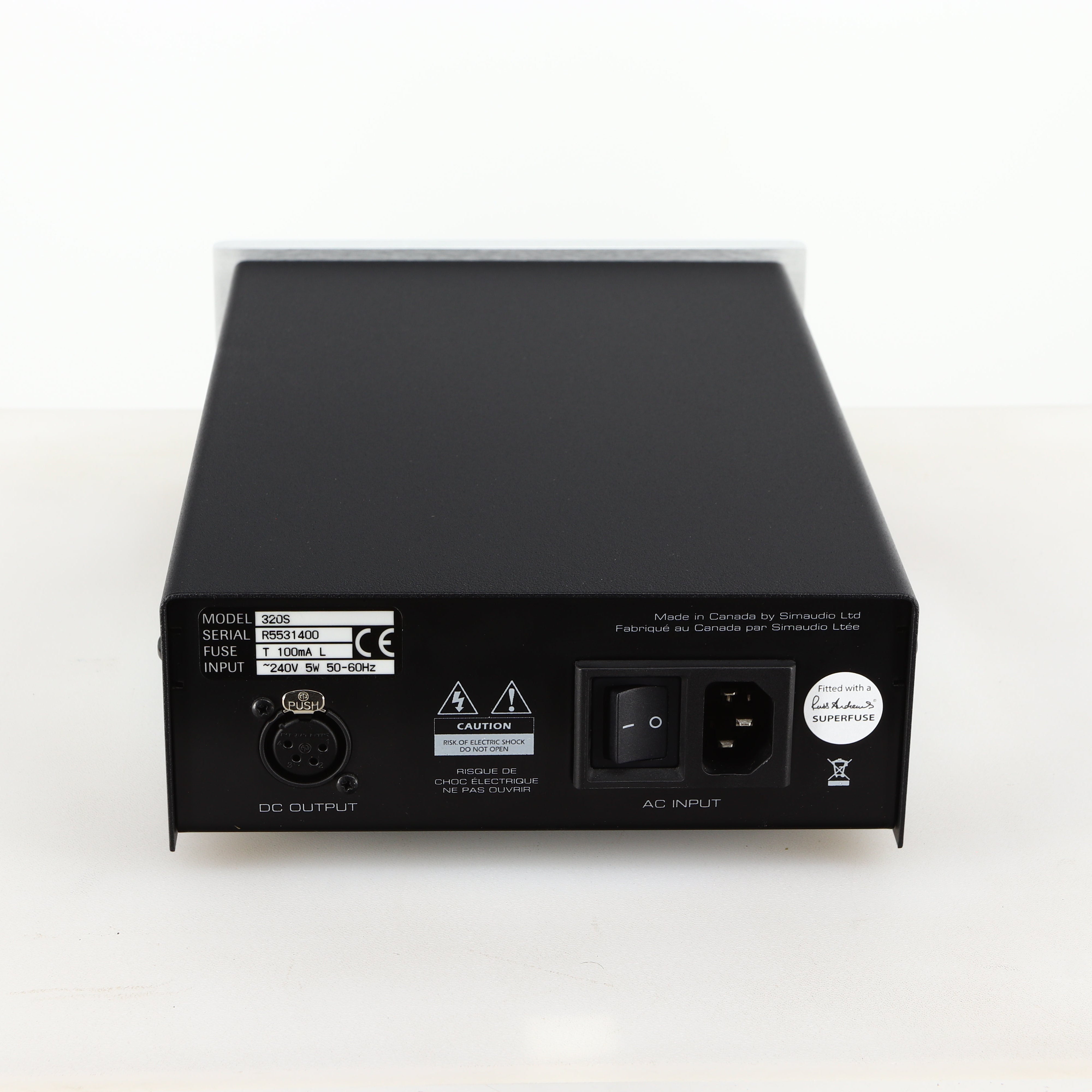 Rear view of a used Moon 320S Power Supply in a silver finish showing Mains Input and DC Output
