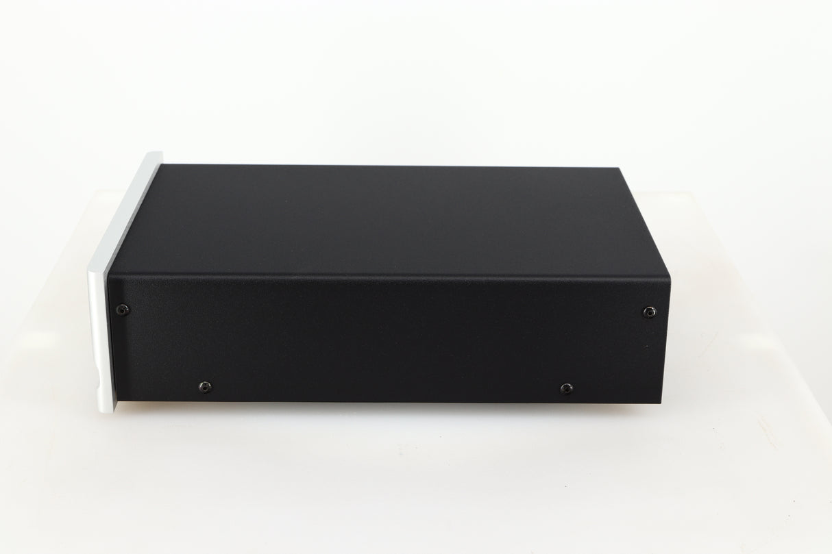 Right side view of a used Moon 320S Power Supply in a silver finish