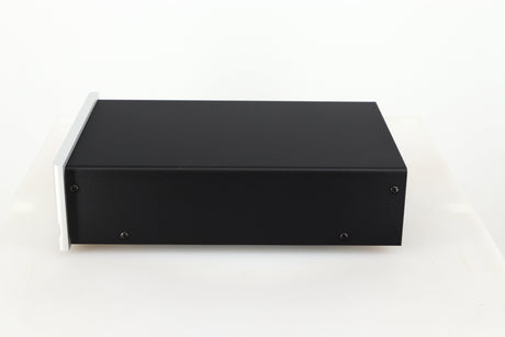 Right side view of a used Moon 320S Power Supply in a silver finish