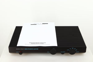Top of a used Musical Fidelity B200 Integrated Amplifier in a black finish showing Manual