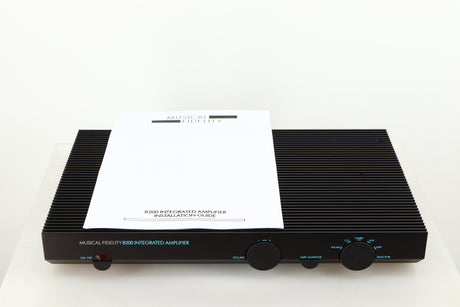 Top of a used Musical Fidelity B200 Integrated Amplifier in a black finish showing Manual