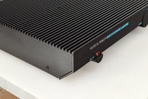 Front left corner of a used Musical Fidelity B200 Integrated Amplifier in a black finish