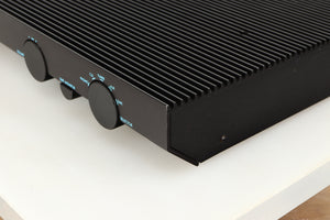 Front right corner of a used Musical Fidelity B200 Integrated Amplifier in a black finish