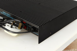 Rear left corner of a used Musical Fidelity B200 Integrated Amplifier in a black finish