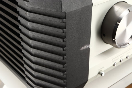 Close up of a used Musical Fidelity KW250S Integrated System showing damage on fascia