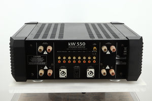Rear view of a used Musical Fidelity KW550 Integrated Amplifier showing speaker outputs, PSU inputs, and RCA outputs