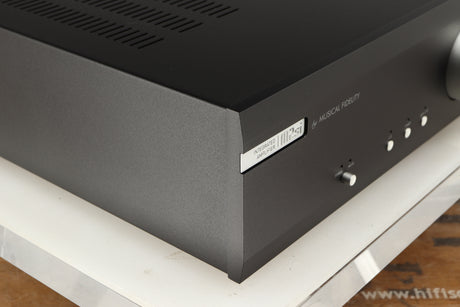 Front left corner of a used Musical Fidelity M2si Integrated Amplifier in a black finish