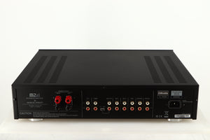 Rear view of a used Musical Fidelity M2si Integrated Amplifier in a black finish showing Speaker Outputs, Mains Input and Phono Outputs