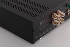 Rear left corner view of a used Musical Fidelity M3si Integrated Amplifier in Black