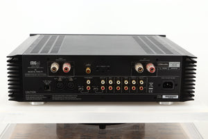 Rear view of a used Musical Fidelity M6si Integrated Amplifier in Black finish showing speaker outputs, XLR, phono, and mains inputs