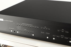 Close up of a used Musical Fidelity M6X DAC in a black finish showing light patch on fascia