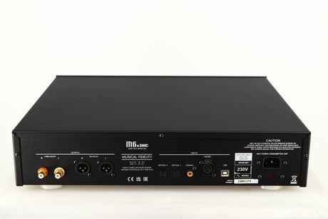 Rear view of a used Musical Fidelity M6X DAC in a black finish showing Phono Outputs, Optical Inputs, USB Input and Mains Input