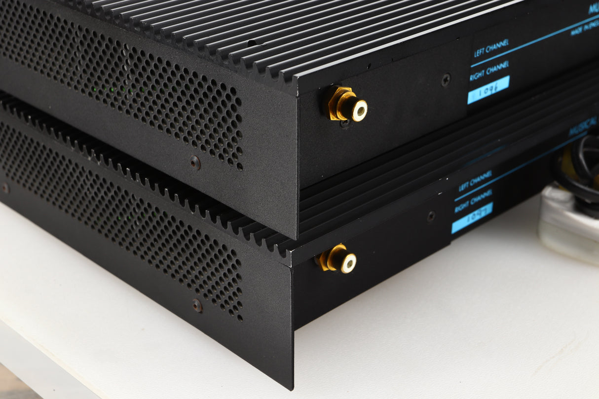 Rear left corner view of a pair of used Musical Fidelity MA50 Class A Monoblock Power Amplifiers in Black finish