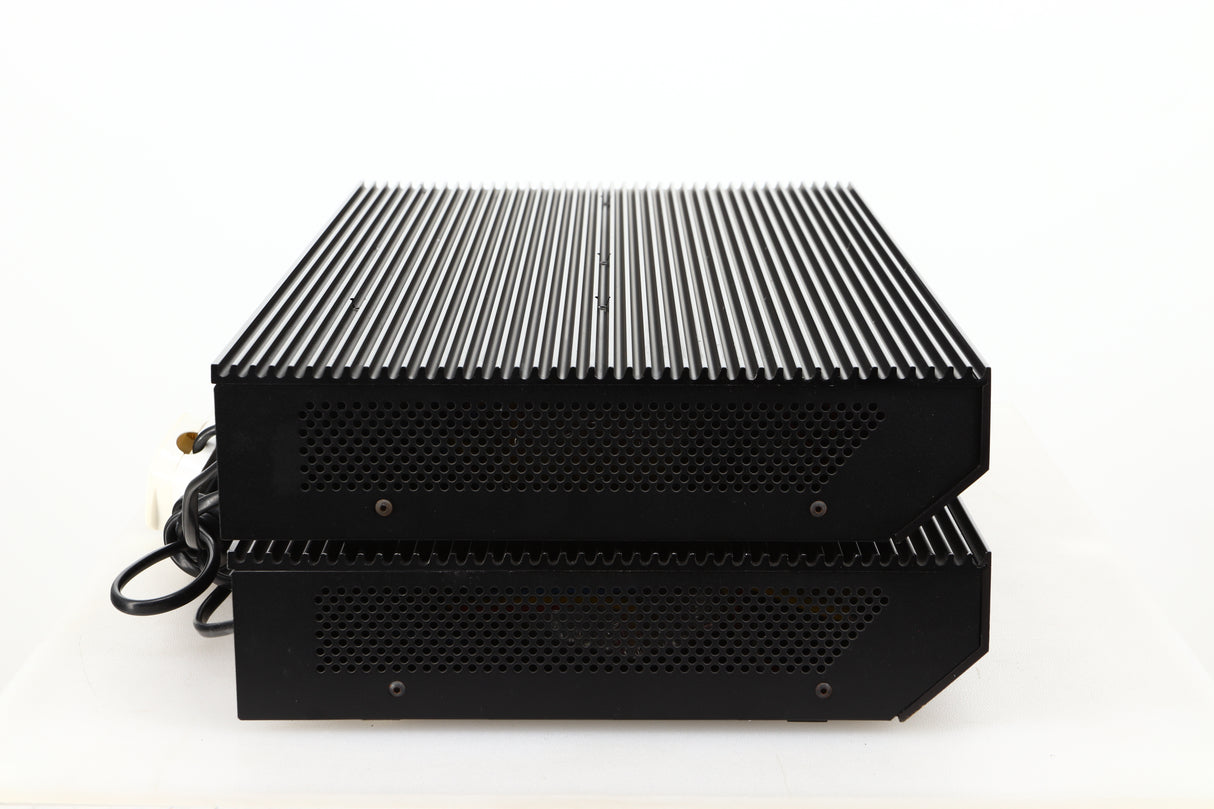 Side view of a pair of used Musical Fidelity MA50 Class A Monoblock Power Amplifiers in Black finish