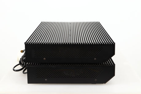 Side view of a pair of used Musical Fidelity MA50 Class A Monoblock Power Amplifiers in Black finish