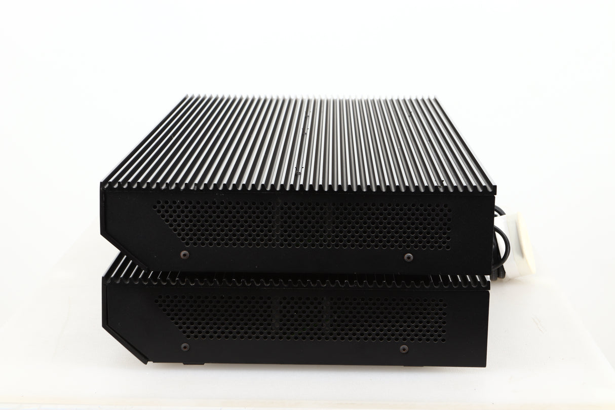 Side view of a pair of used Musical Fidelity MA50 Class A Monoblock Power Amplifiers in Black finish