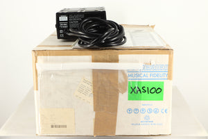 Box of a used Musical Fidelity X-AS100 Power Amplifier with PSU and Manual