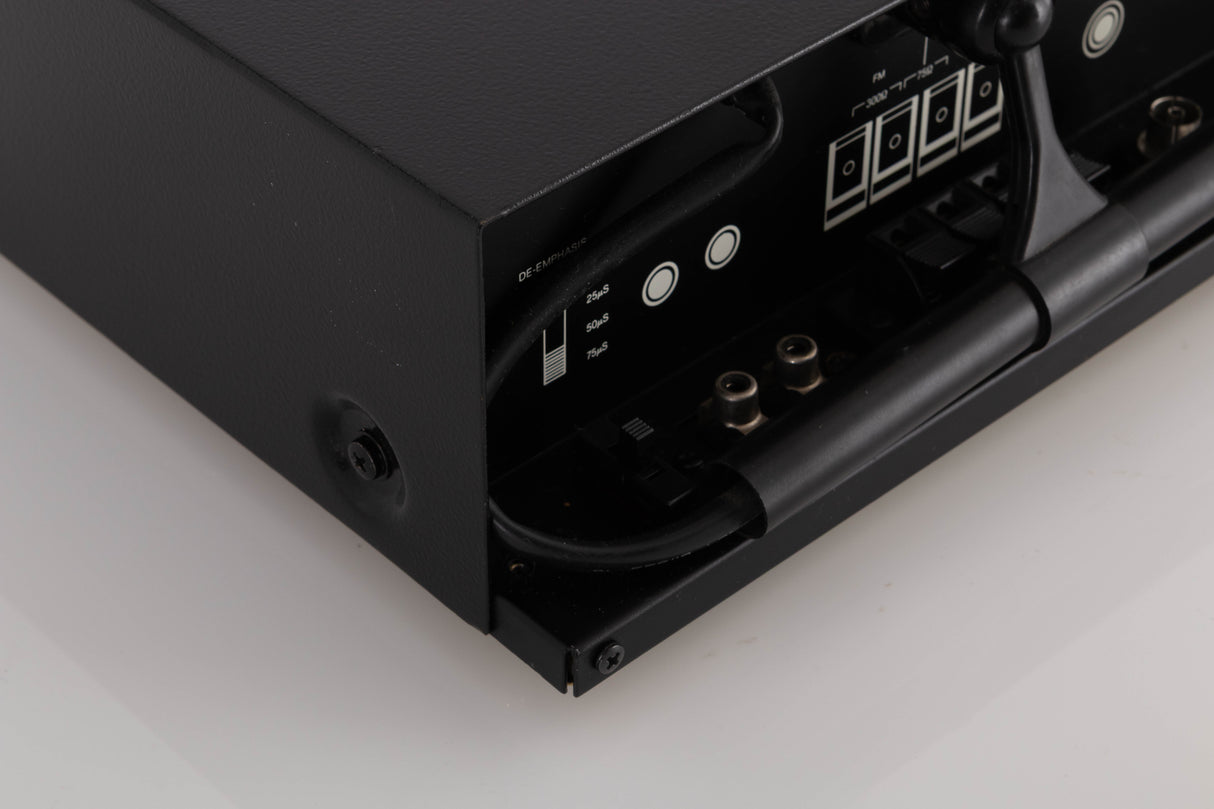 Rear left corner view of a used NAD 4020 Tuner