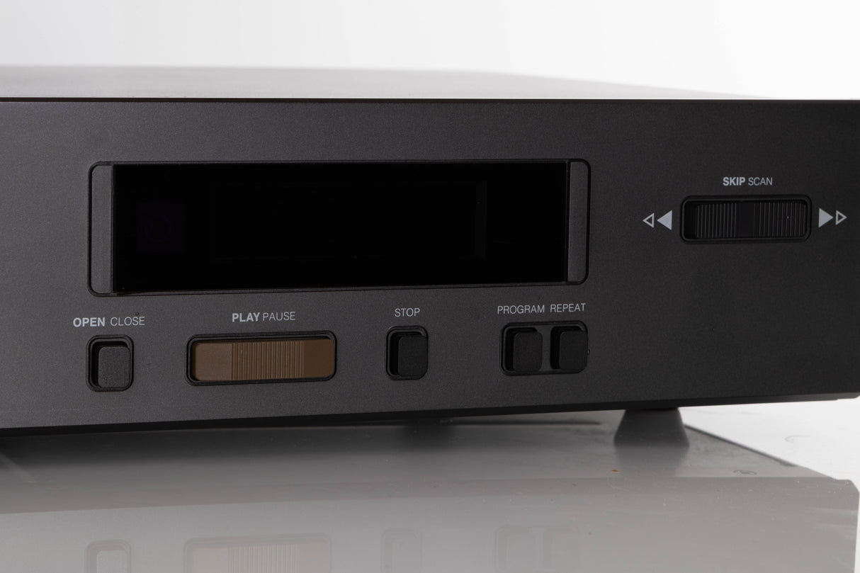 Close up of a used NAD 5425 CD Player showing some scratching on screen