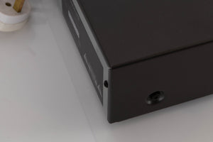 Rear left corner of a used NAD 5425 CD Player 