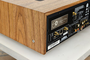 Close up view of the back left corner of a used NAD C3050 LE Integrated Amplifier