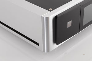 Front left corner of a used NAD M33 V1 BluOS Streaming DAC Integrated Amplifier