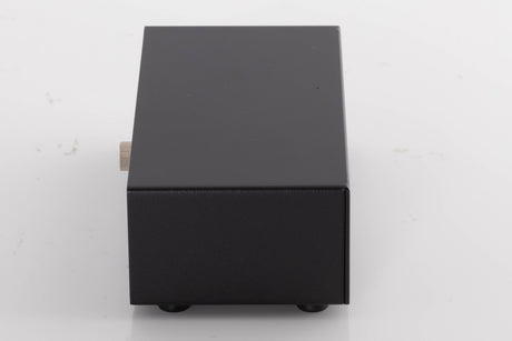 Left side view of a used NAD PP3i Phono / USB Pre Amplifier in a Black finish