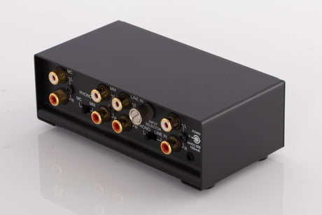 Rear left corner of a used NAD PP3i Phono / USB Pre Amplifier in a Black finish