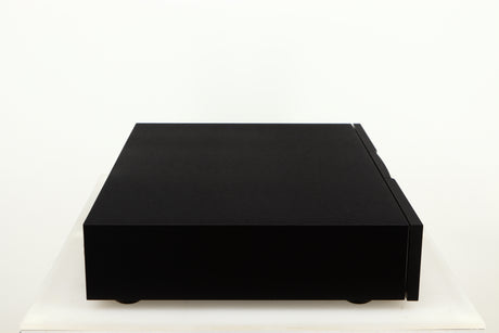 Left side view of a used Naim CD555PS DR Power Supply in a black finish