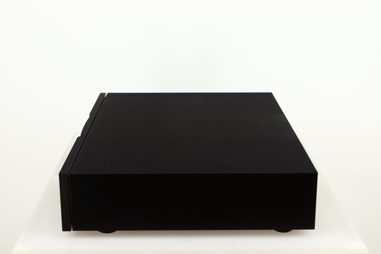 Right side view of a used Naim CD555PS DR Power Supply in a black finish